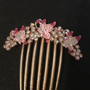 Gold and pink fancy hair comb. Butterflies